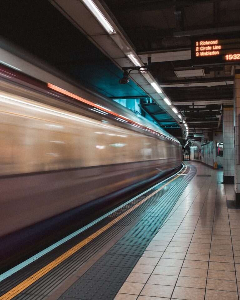 time lapse photography of train station