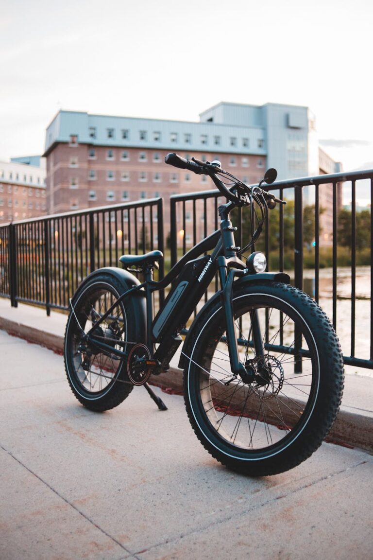 a black bicycle parked on the street