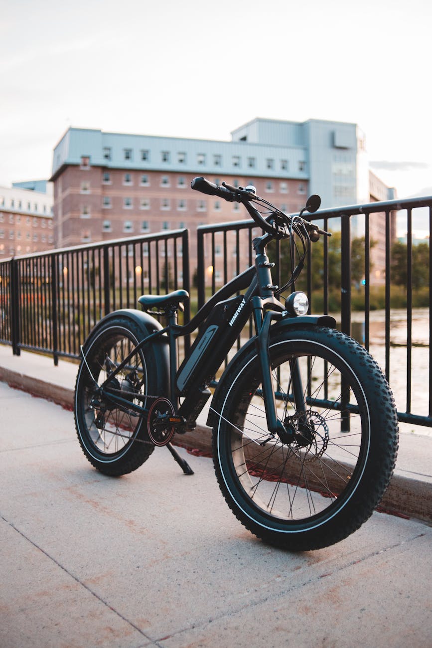 a black bicycle parked on the street