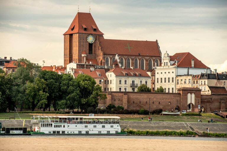 st johns cathedral over river in torun in poland