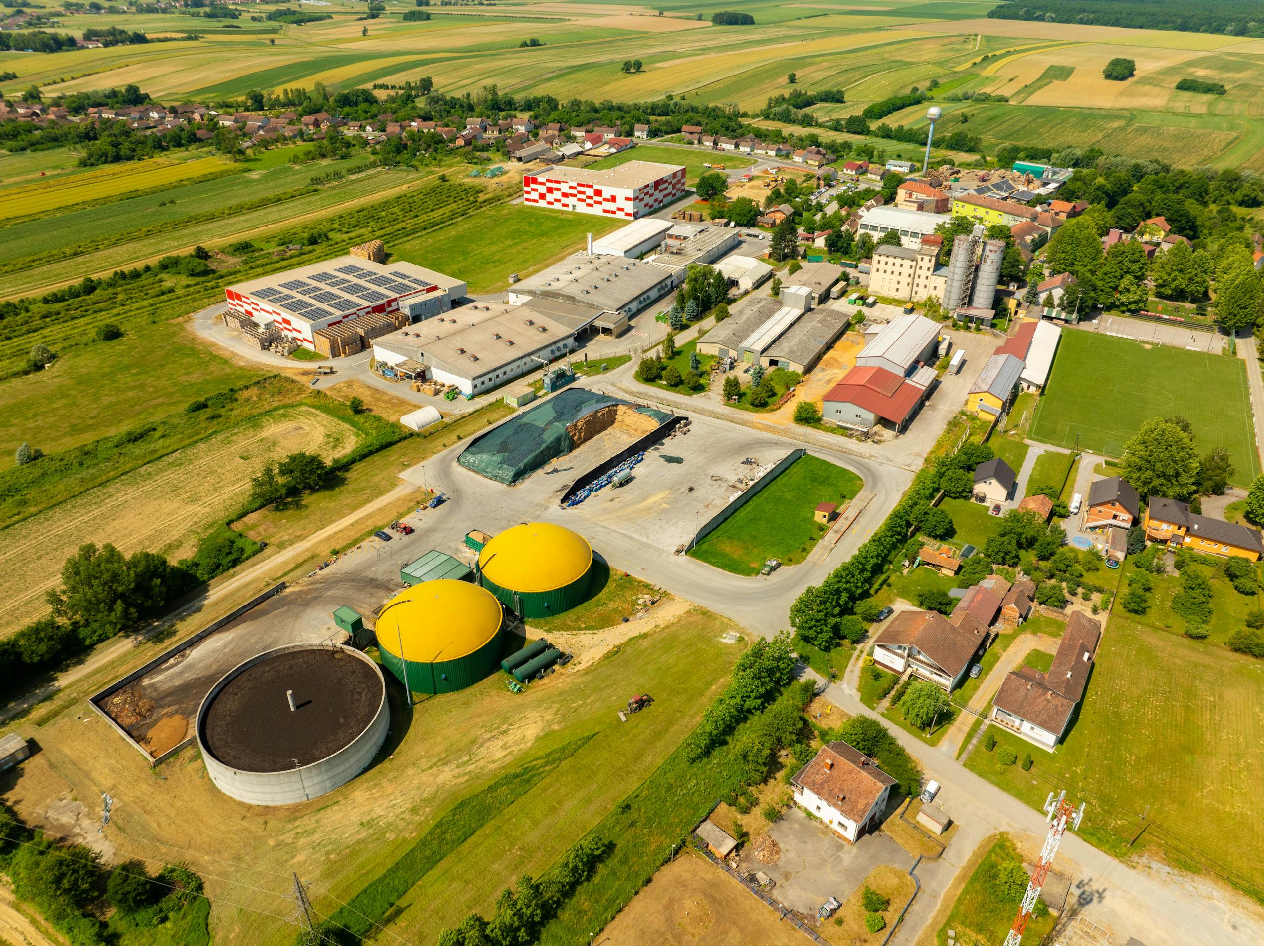 Aerial shot of an industrial facility in Hercegovac, Croatia during the day.
